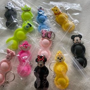 11 pack Of character Dimple Keychains